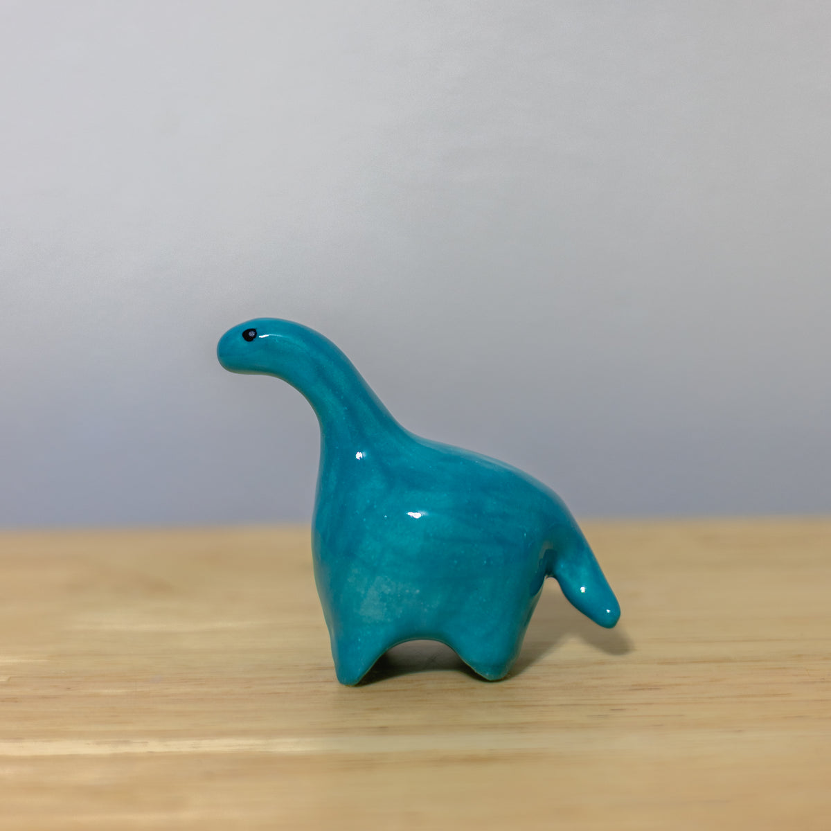 Teal Dino Figurine
