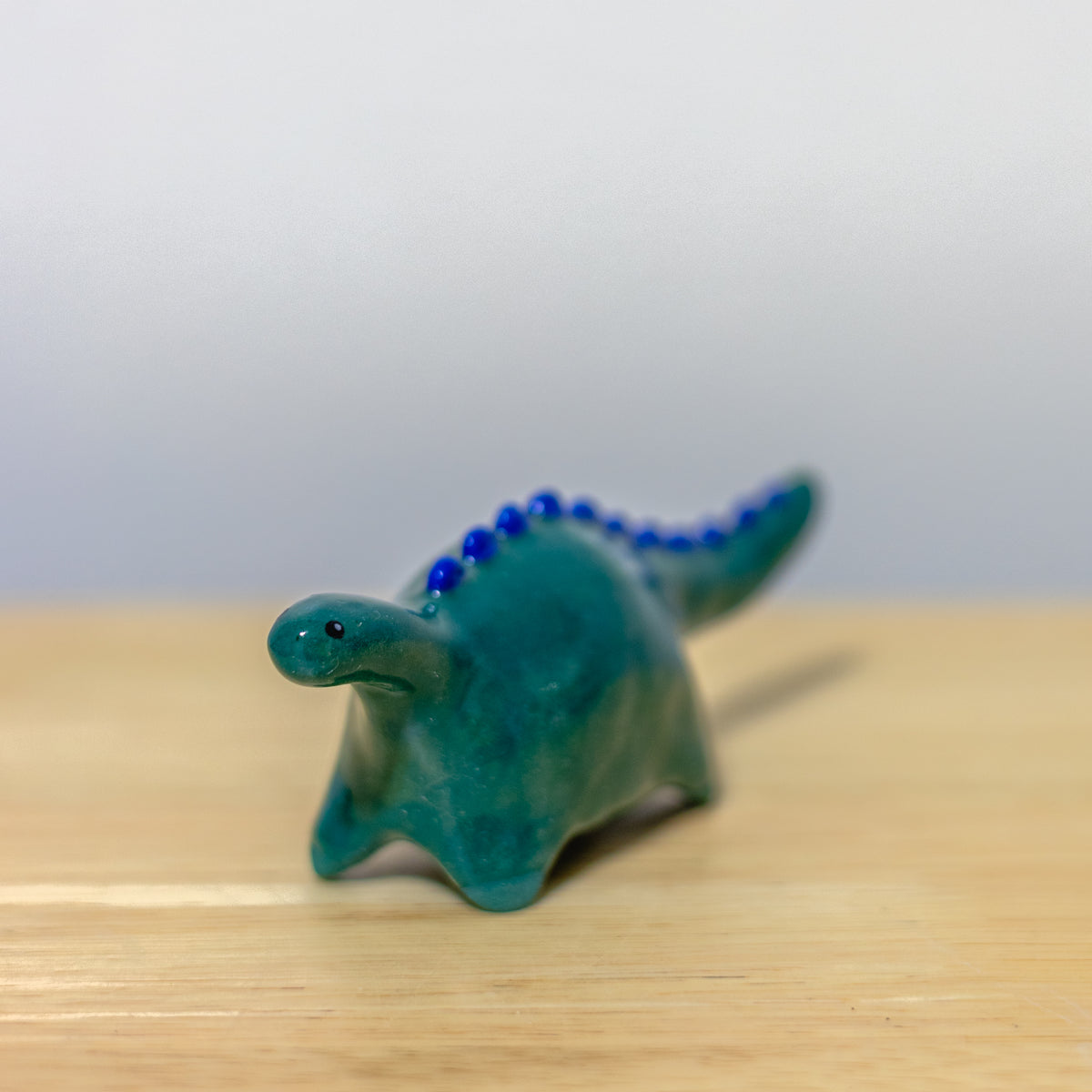 Green Dino Figurine