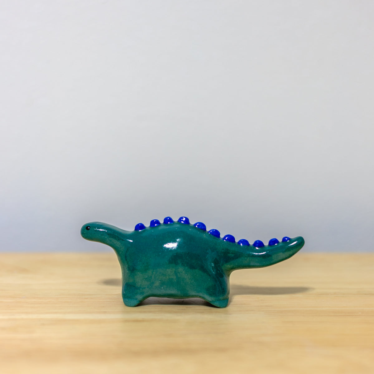Green Dino Figurine